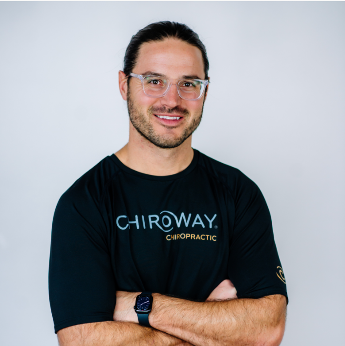 Dr. Trent Scheidecker outside a ChiroWay Center